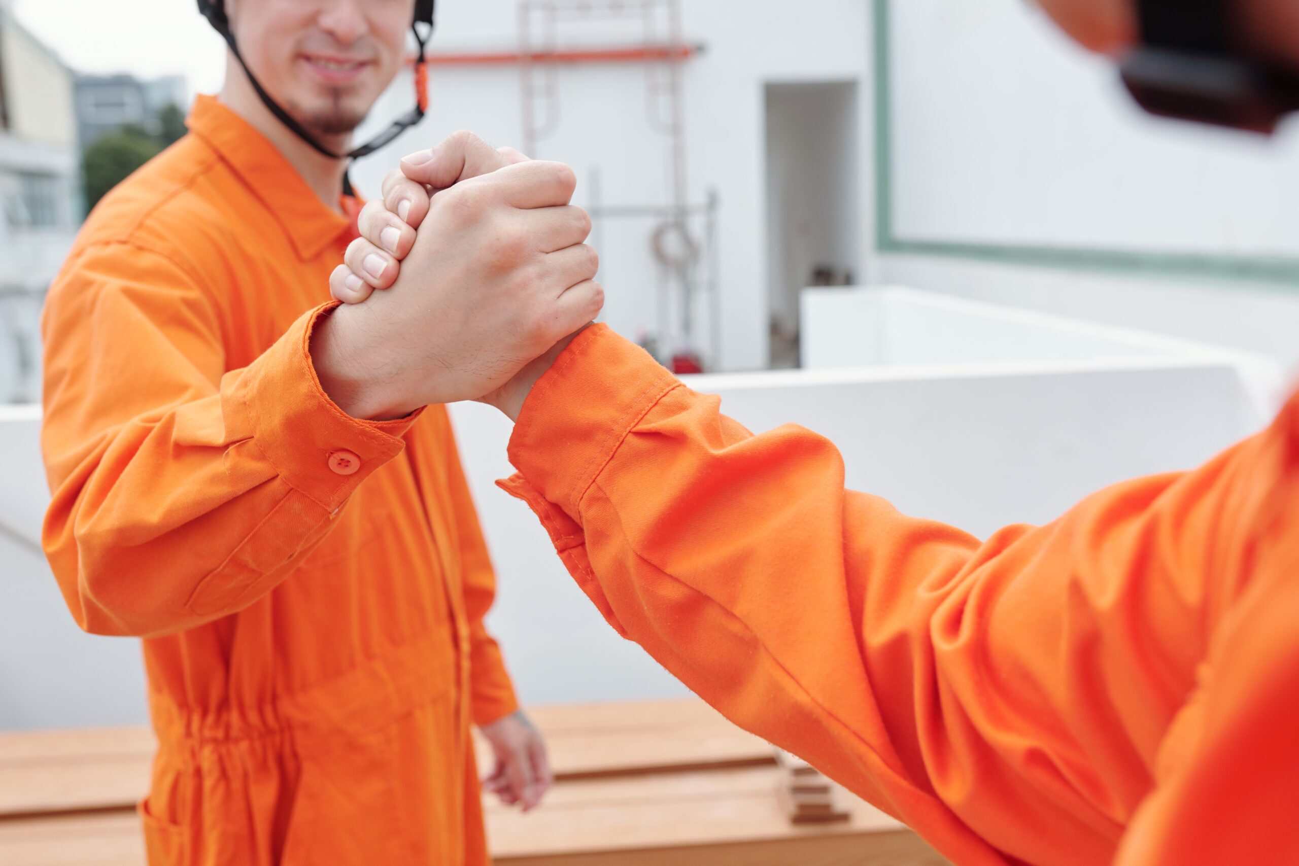 Construction Workers Greeting Each Other
