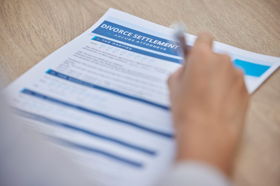Divorce paperwork, woman hands and signature for agreement, contract and legal documents on desk. F