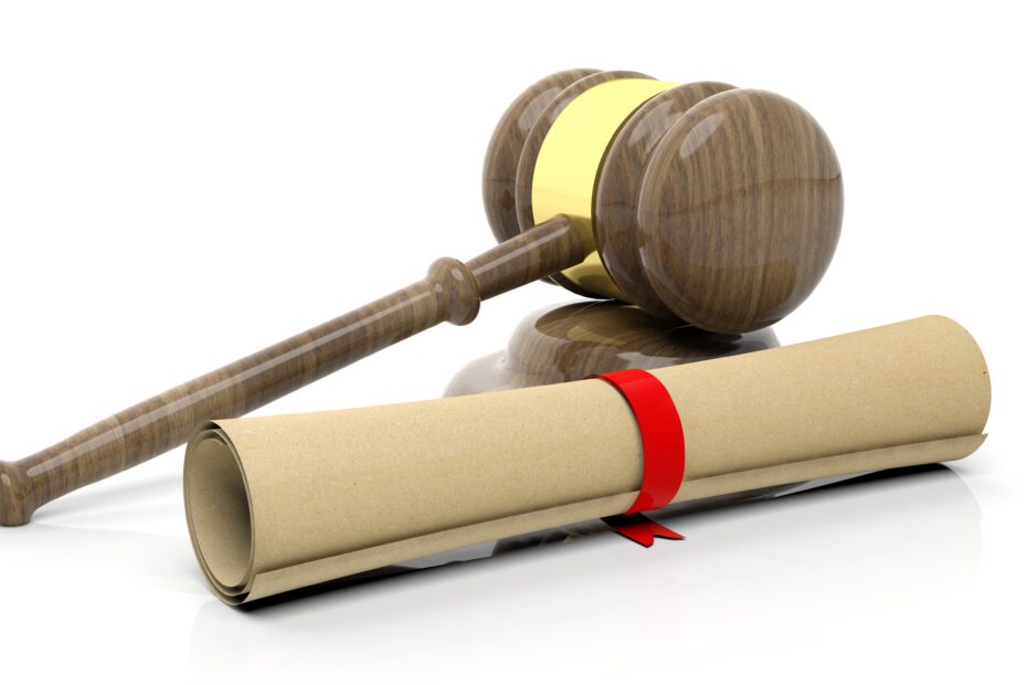 Gavel with scroll, isolated on white background