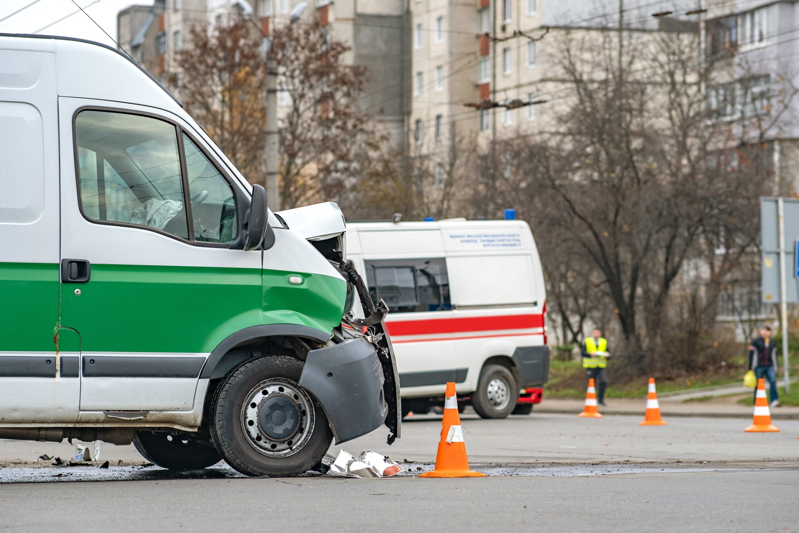 Heavily damaged car after car crash accident on a city street