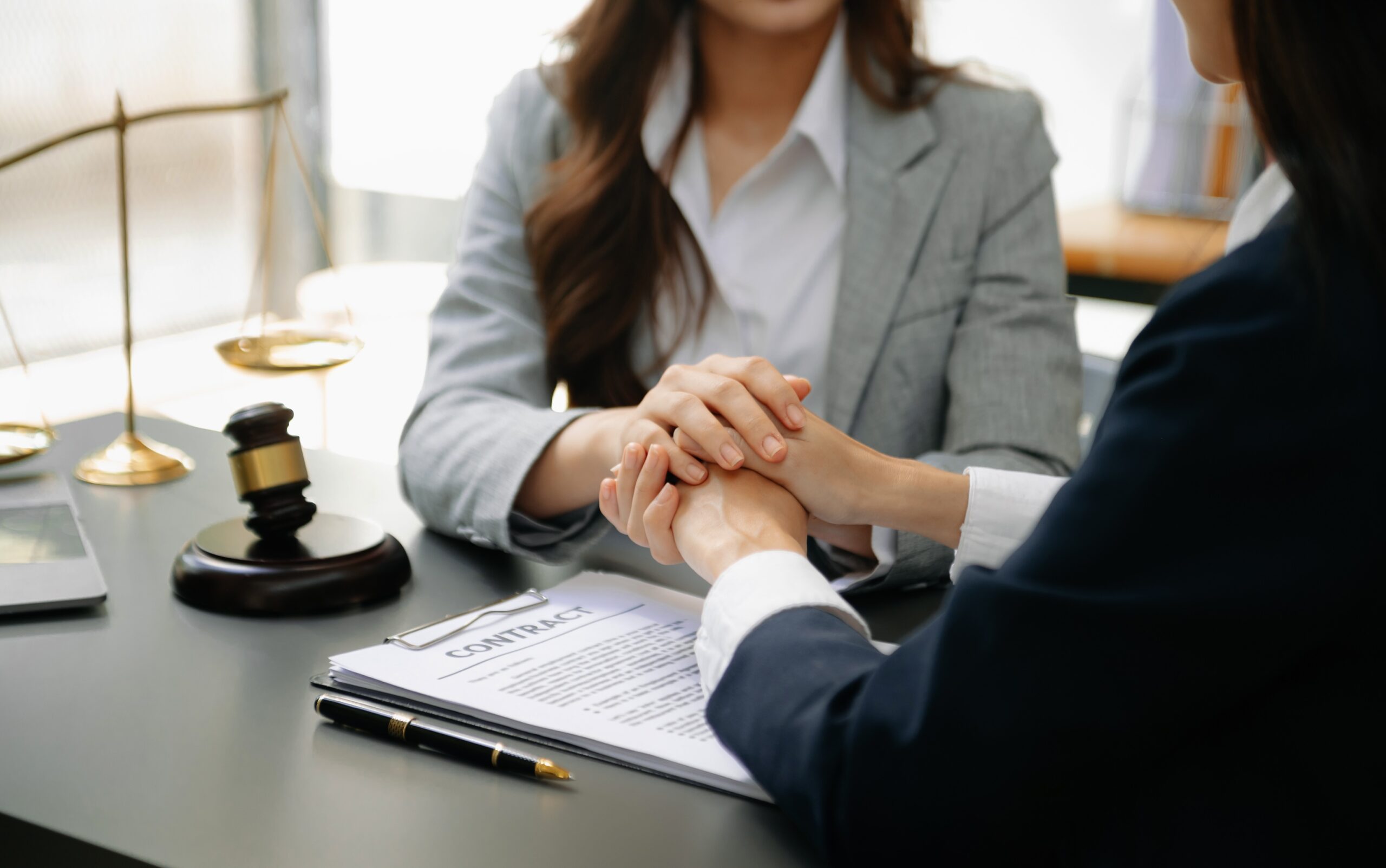 Judge gavel with scales of justice, Business and lawyer or counselor consulting and discussing