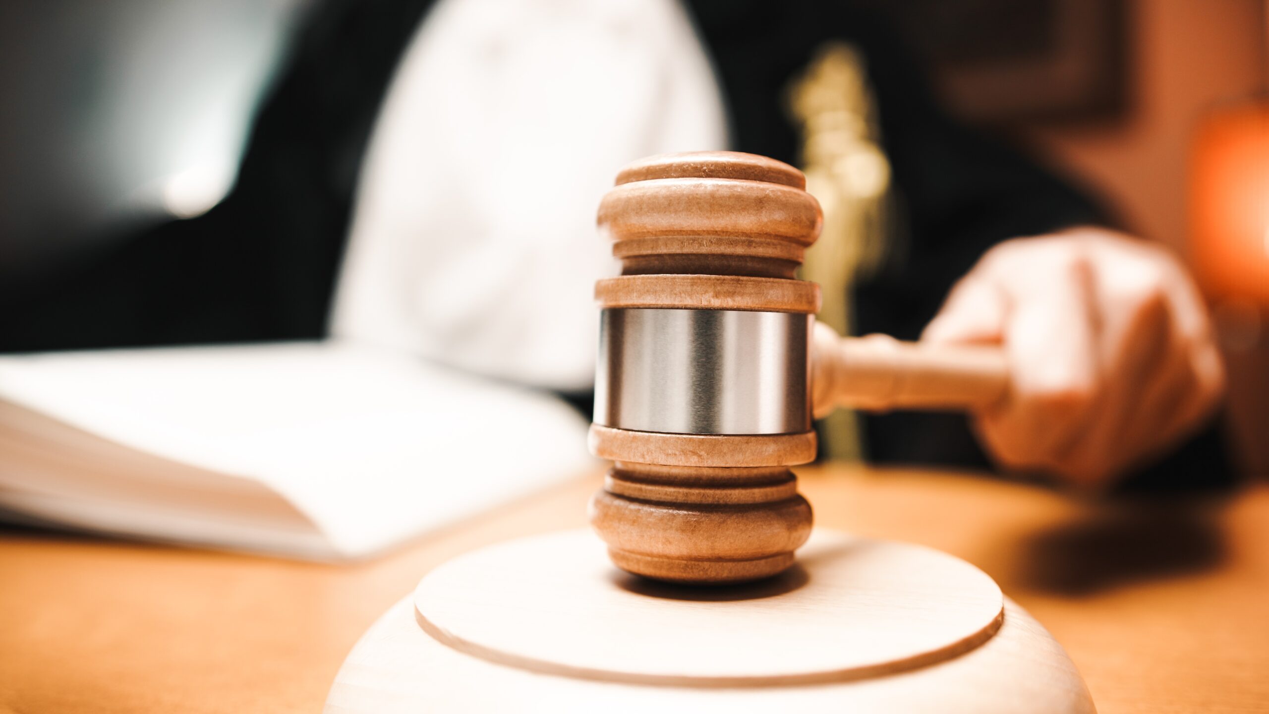 Judge Issues Sentence with wooden gravel