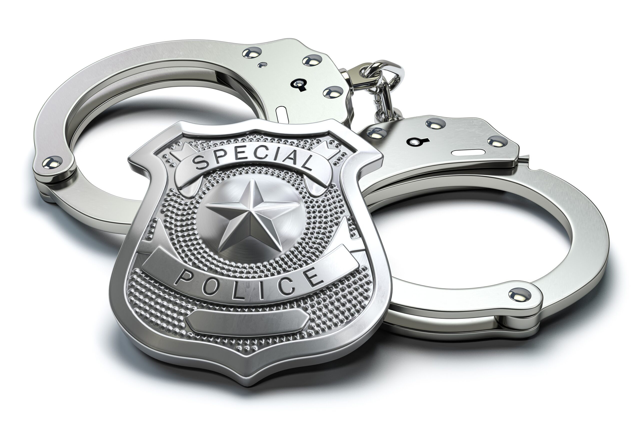 Special police badge and handcuffs isolated on white background. Law enforcement amd security.